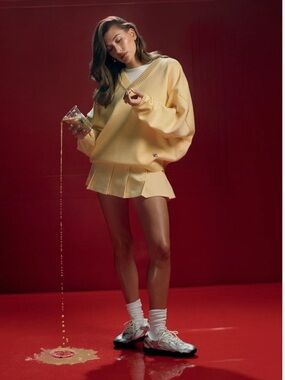 Fila x Hailey v neck sweater in yellow. Never worn excellent condition